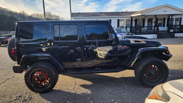 used 2014 Jeep Wrangler Unlimited car, priced at $19,950