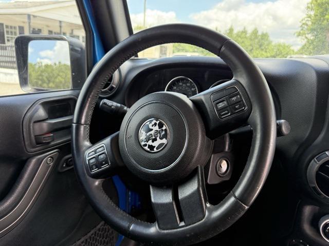 used 2015 Jeep Wrangler Unlimited car, priced at $16,405
