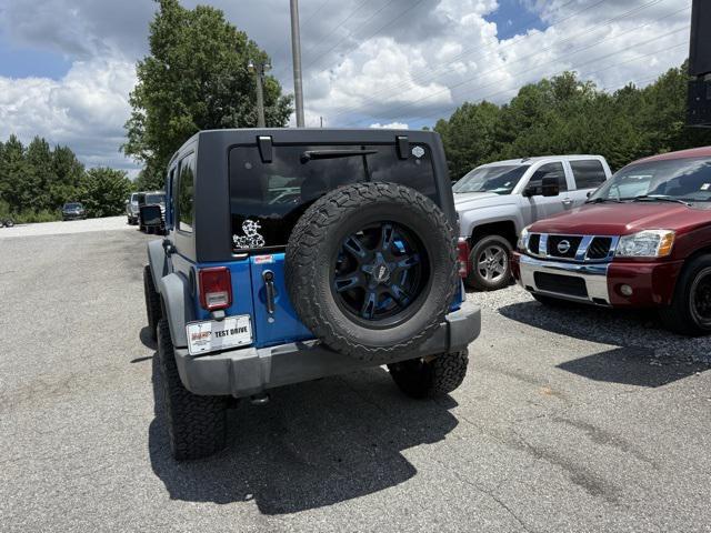 used 2015 Jeep Wrangler Unlimited car, priced at $16,405