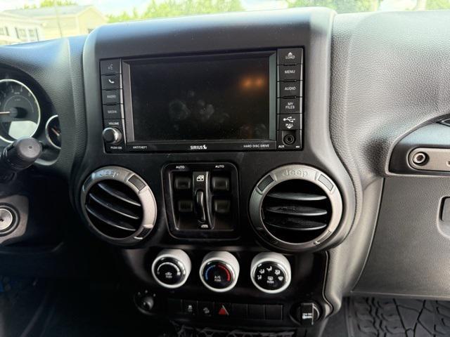 used 2015 Jeep Wrangler Unlimited car, priced at $16,405