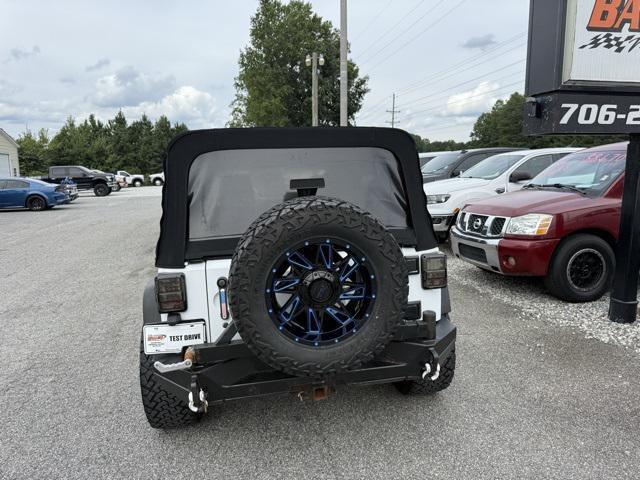 used 2014 Jeep Wrangler Unlimited car, priced at $18,950