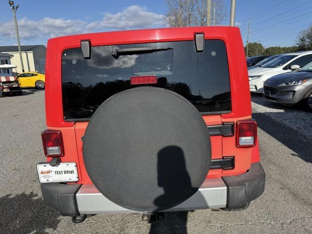 used 2013 Jeep Wrangler Unlimited car, priced at $17,950