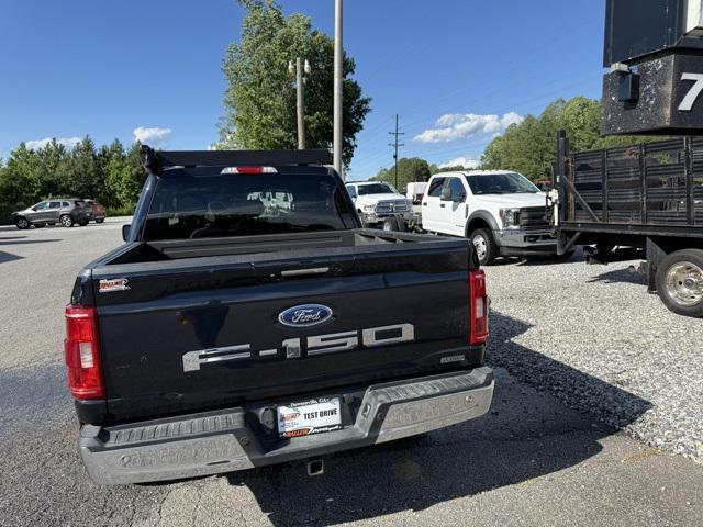 used 2021 Ford F-150 car, priced at $25,504
