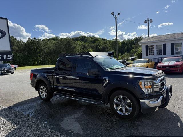 used 2021 Ford F-150 car, priced at $25,504