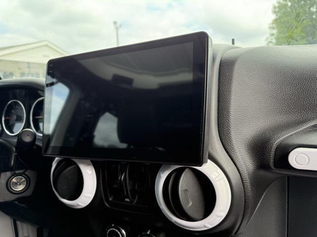 used 2016 Jeep Wrangler Unlimited car, priced at $20,321