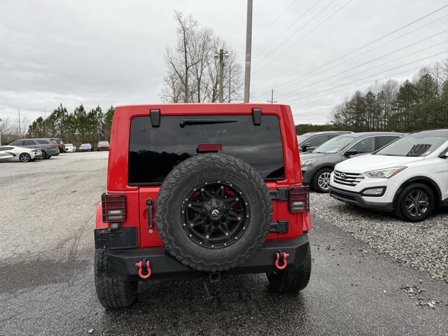 used 2015 Jeep Wrangler Unlimited car, priced at $13,950