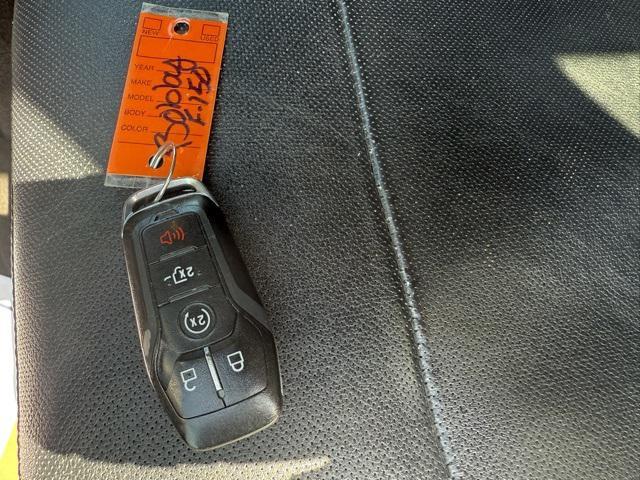 used 2015 Ford F-150 car, priced at $14,000