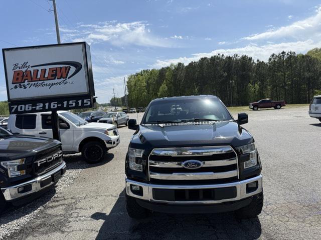 used 2015 Ford F-150 car, priced at $14,000