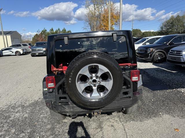 used 2012 Jeep Wrangler Unlimited car, priced at $9,122