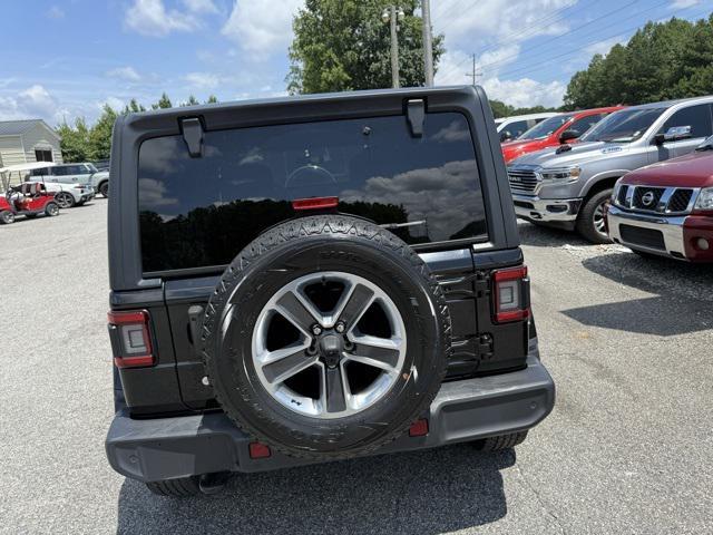 used 2018 Jeep Wrangler Unlimited car, priced at $25,348