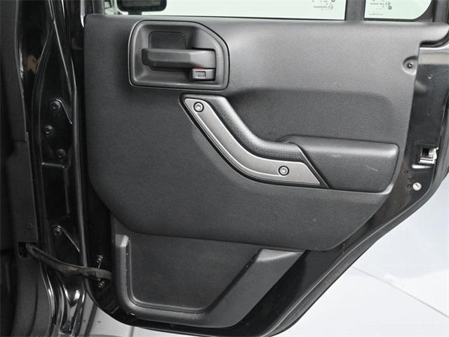 used 2015 Jeep Wrangler Unlimited car, priced at $19,817