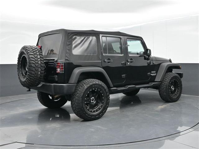 used 2015 Jeep Wrangler Unlimited car, priced at $19,817