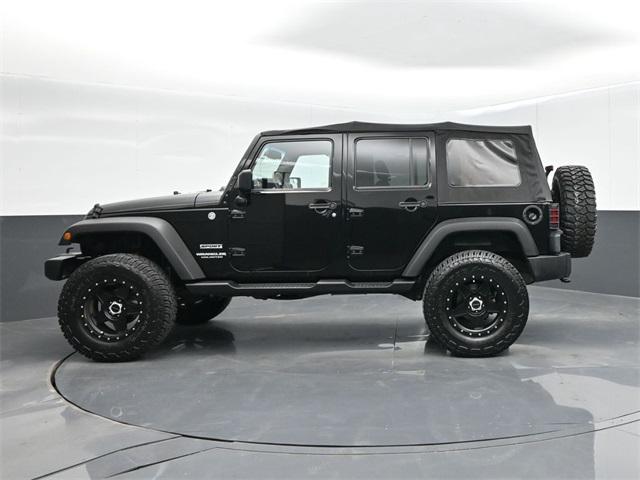 used 2015 Jeep Wrangler Unlimited car, priced at $19,817