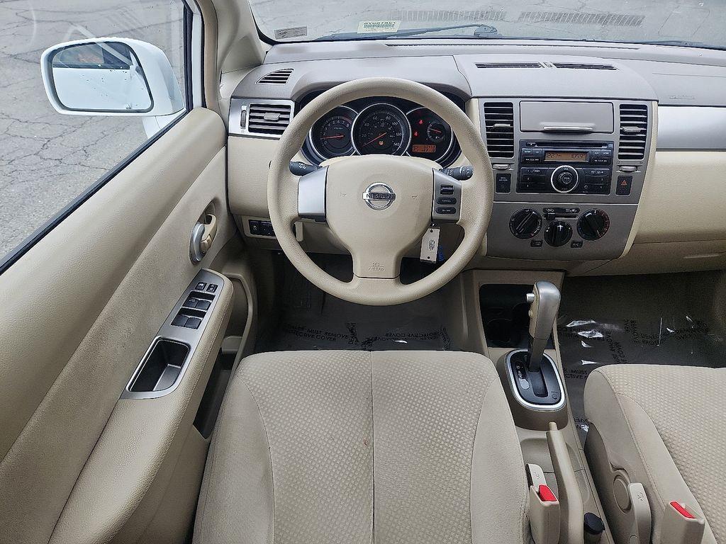 used 2012 Nissan Versa car, priced at $5,700