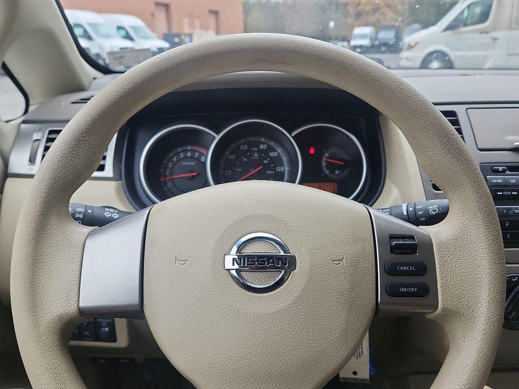 used 2012 Nissan Versa car, priced at $5,700