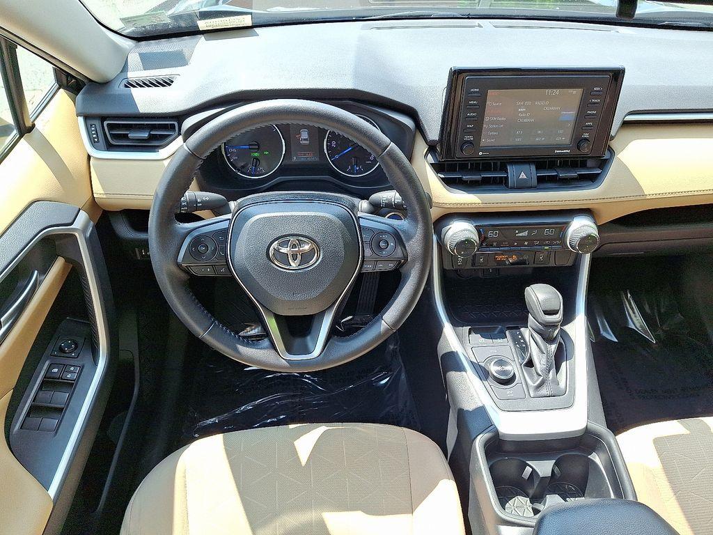 used 2021 Toyota RAV4 Hybrid car, priced at $28,100