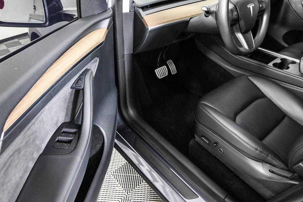 used 2023 Tesla Model Y car, priced at $35,131