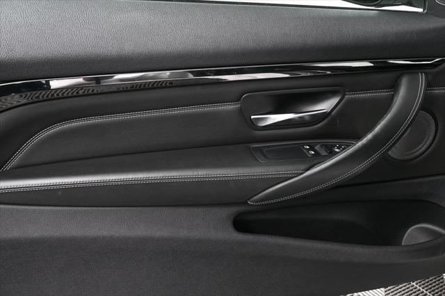 used 2015 BMW M4 car, priced at $44,045