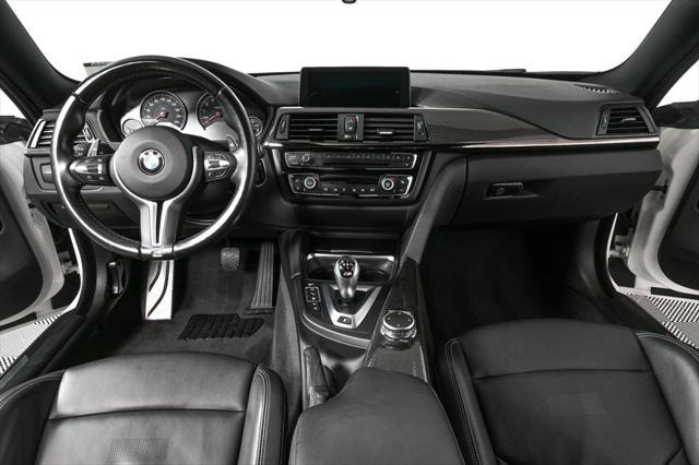used 2015 BMW M4 car, priced at $44,045