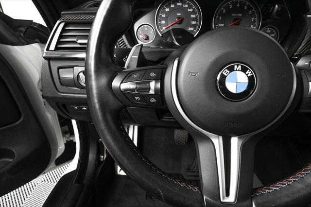 used 2015 BMW M4 car, priced at $44,045