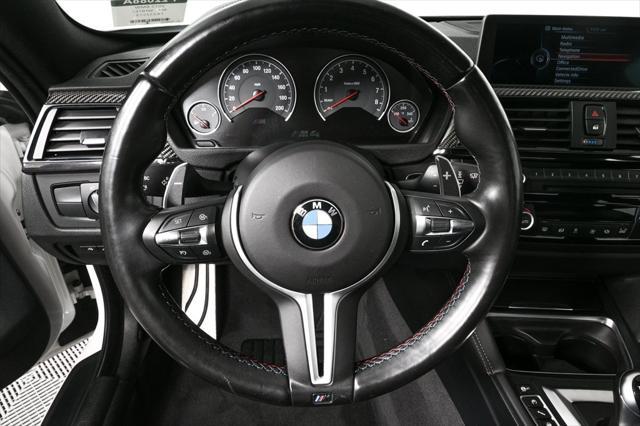 used 2015 BMW M4 car, priced at $44,045