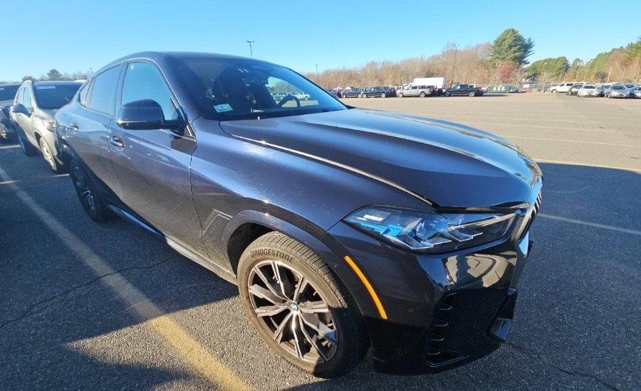 used 2024 BMW X6 car, priced at $65,898