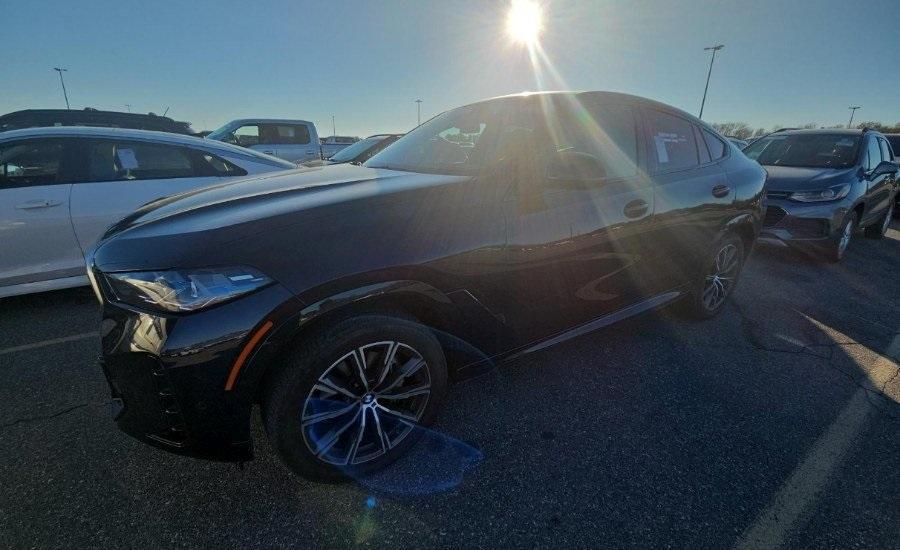 used 2024 BMW X6 car, priced at $65,898