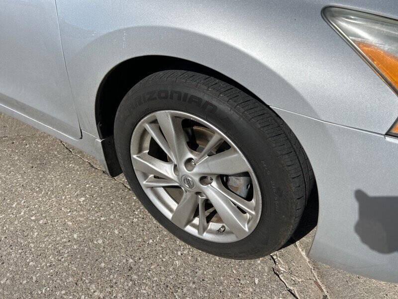 used 2015 Nissan Altima car, priced at $10,500