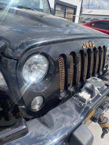 used 2014 Jeep Wrangler Unlimited car, priced at $17,995