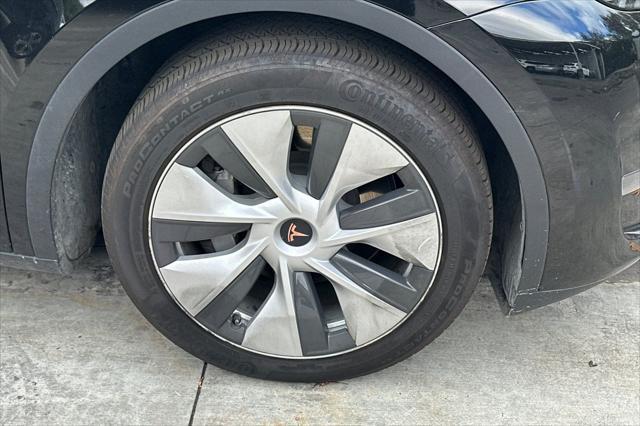 used 2023 Tesla Model Y car, priced at $30,694