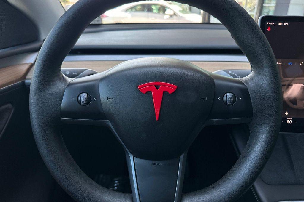 used 2023 Tesla Model Y car, priced at $30,694
