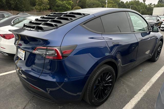 used 2024 Tesla Model Y car, priced at $33,225