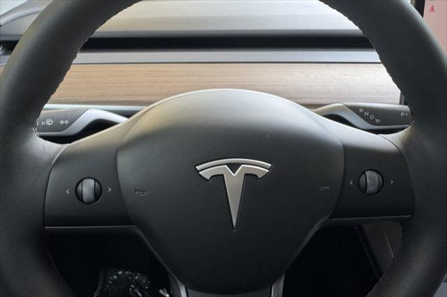 used 2024 Tesla Model Y car, priced at $33,225