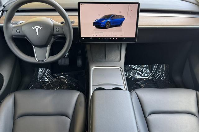 used 2024 Tesla Model Y car, priced at $33,225