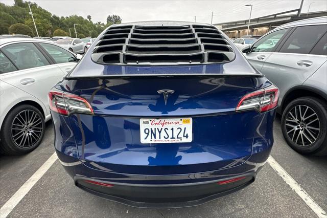 used 2024 Tesla Model Y car, priced at $33,225