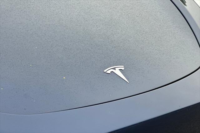used 2024 Tesla Model Y car, priced at $33,225