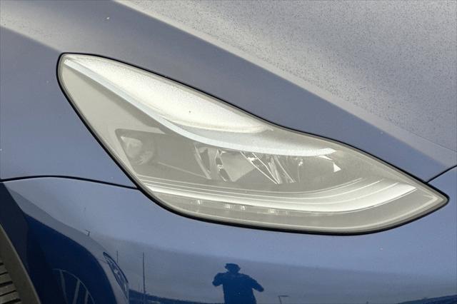 used 2024 Tesla Model Y car, priced at $33,225