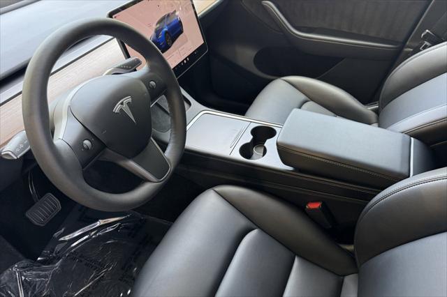 used 2024 Tesla Model Y car, priced at $33,225