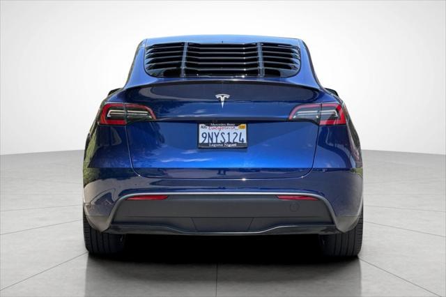 used 2024 Tesla Model Y car, priced at $33,225