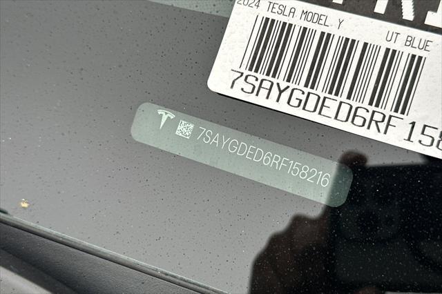 used 2024 Tesla Model Y car, priced at $33,225