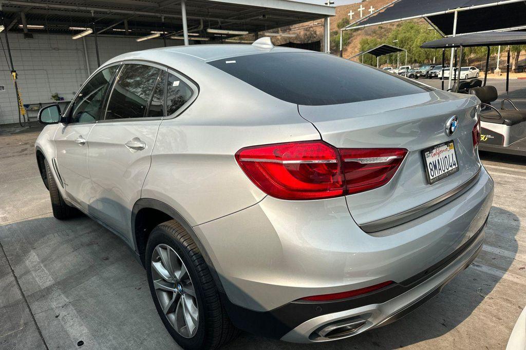 used 2019 BMW X6 car, priced at $27,000