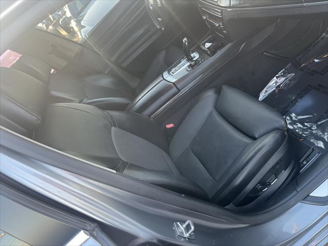 used 2012 BMW 750 car, priced at $9,995