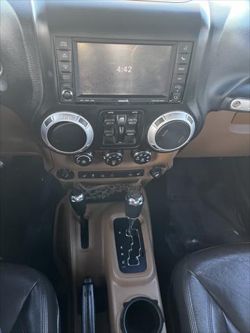 used 2014 Jeep Wrangler Unlimited car, priced at $15,995