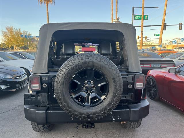 used 2014 Jeep Wrangler Unlimited car, priced at $15,995