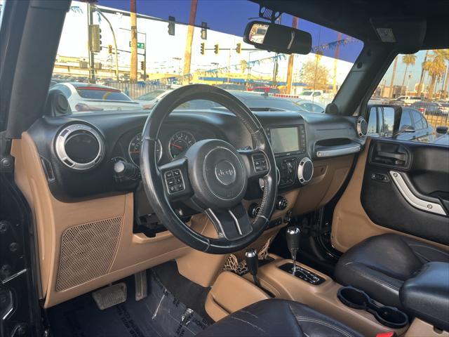 used 2014 Jeep Wrangler Unlimited car, priced at $15,995