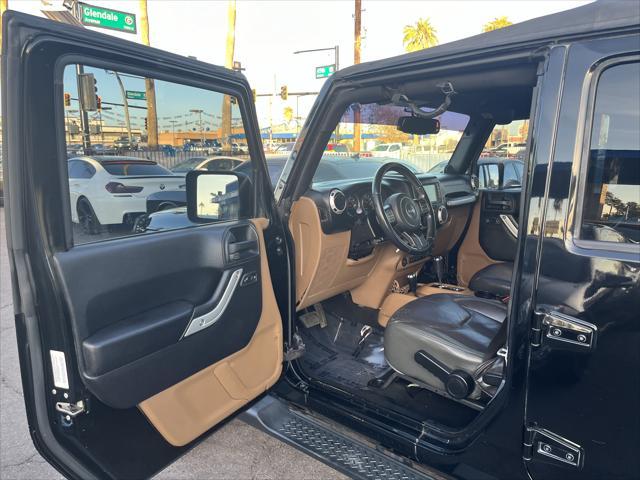 used 2014 Jeep Wrangler Unlimited car, priced at $15,995