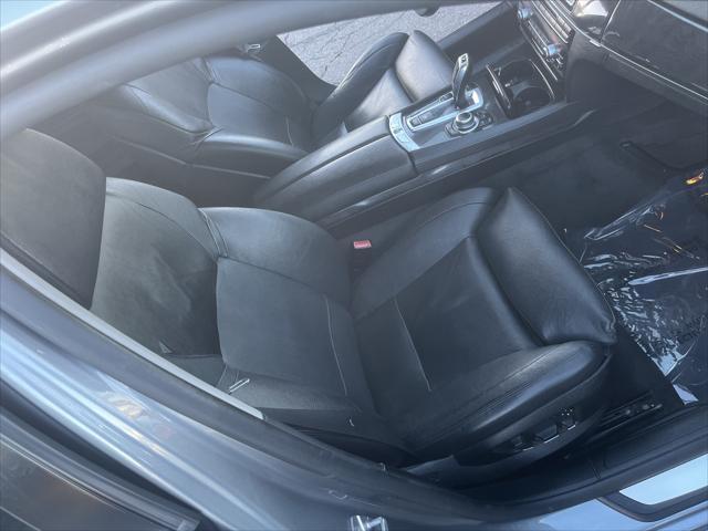 used 2011 BMW 750 car, priced at $7,995