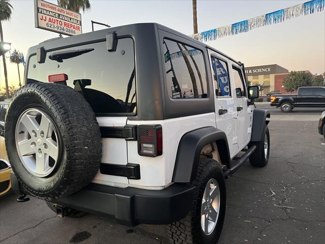 used 2013 Jeep Wrangler Unlimited car, priced at $15,995