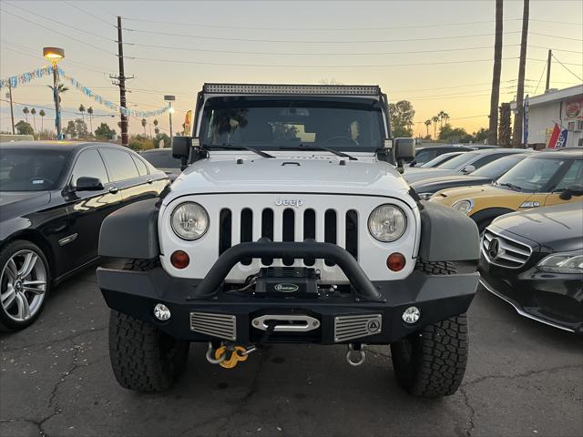 used 2013 Jeep Wrangler Unlimited car, priced at $15,995