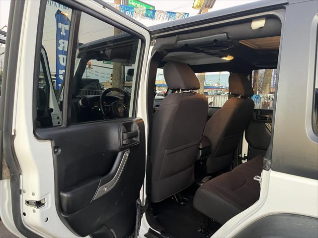 used 2013 Jeep Wrangler Unlimited car, priced at $15,995